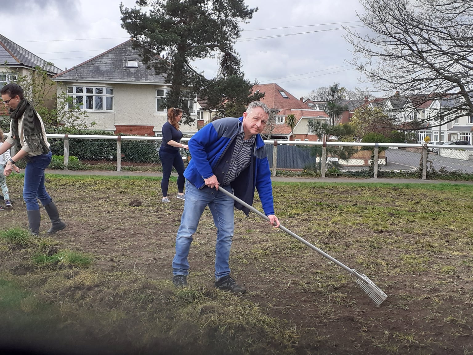 Simon Bull helping to plant wildflower at Winton Rec