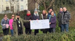 The Asda Foundation presenting a cheque to Friends of Knyveton & Spencer Gardens